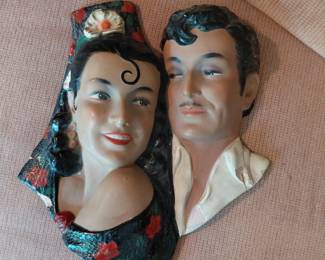 Chalkware wall mask pair, Spanish dancers