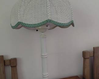 White wicker table lamp with scalloped shade