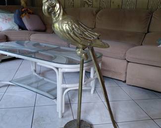 Brass bird sculpture on stand