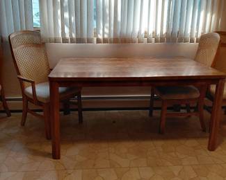 Dining table with cane back chairs