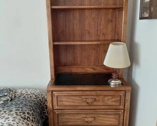 Bookcase hutch over three drawer chest with lamp