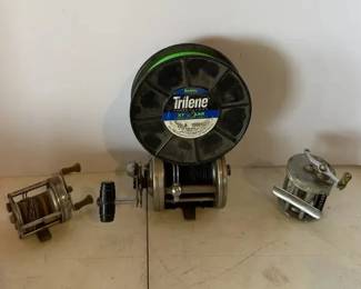 Three Vintage Metal Fishing Reels with Extra Line