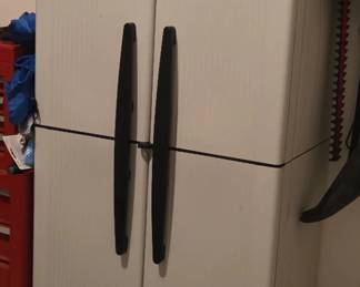 Tall plastic storage cabinet