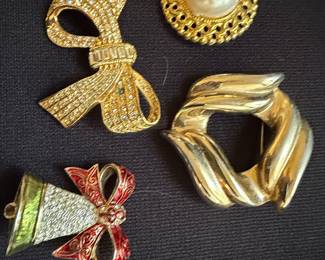 Assorted Vintage Costume Jewelry Brooches: Bows, Pearl, Abstract, and Bell