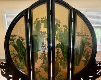 Stunning Asian-inspired folding room divider / decorative screen featuring carved dark wood frames, intricate landscape scenes, floral designs, birds, and traditional calligraphy. This is a large statement piece with beautiful detailing throughout and would make an incredible accent in a living room, dining room, entryway, or collection.  A truly eye-catching estate find — large, decorative, and full of character.