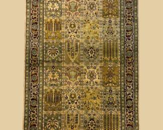 Soft blue, ivory, and gold traditional rug featuring an intricate all-over pattern with a large central medallion.