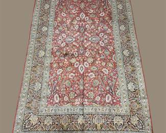 Soft rose, ivory, and muted red traditional rug featuring an intricate medallion and detailed floral border.