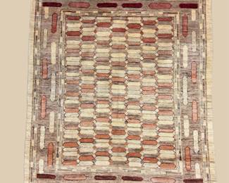 Ivory and beige geometric rug featuring a repeating dimensional block pattern for a distinctive textured look.