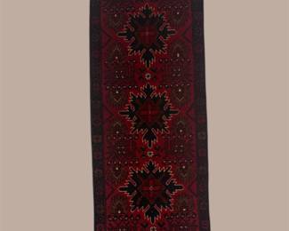 Dark blue and muted red runner featuring a subtle repeating pattern and deep traditional color palette.