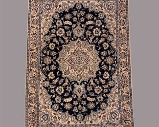 Aqua blue and ivory traditional rug featuring an elegant center medallion surrounded by delicate floral motifs.