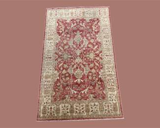 Soft blush and ivory vintage style rug with delicate traditional detailing.