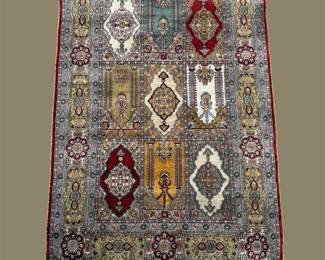 Unique decorative rug featuring colorful architectural-inspired motifs and an artistic pictorial design.