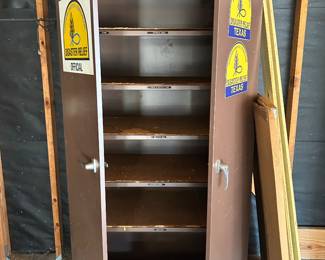 Tin garage cabinet for tools and storage. 