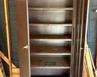 Tin garage cabinet for tools and storage. 