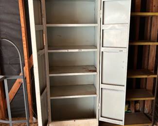 Tin garage cabinet for tools and storage. 