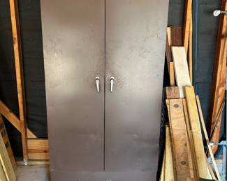 Tin garage cabinet for tools and storage. 