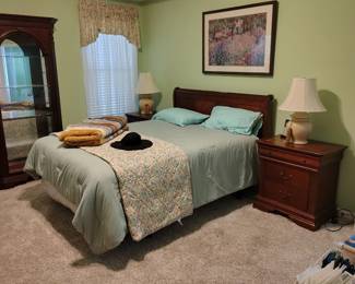 Bedroom suite includes night stands dresser and chest of drawer