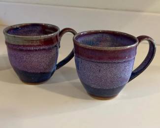 053 pairofhandthrownpotterymugspurple