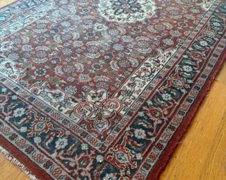 160 orientalstylewoolarearugwithmedall