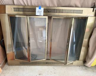 $40 - Solid brass fireplace screen. Heavy! (44" wide x 32" tall)