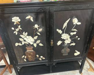 Ivory mounted cabinet