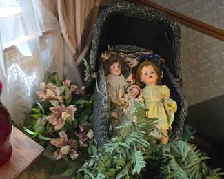 Antique dolls and old buggy