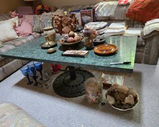 Nice stone top coffee table with iron base