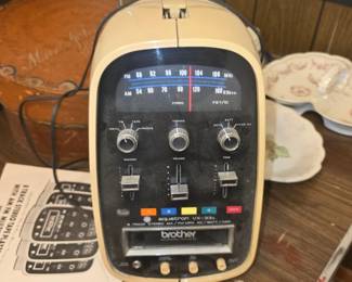 vintage Brother Aquatron VX-33 (or VX-33B/VX-33C) portable 8-track tape player and AM/FM stereo radio from the 1970s, famously nicknamed "The Egg" due to its distinctive rounded, space-age enclosure.