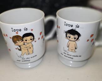 vintage Love Is... white ceramic pedestal coffee mugs from 1972, featuring cartoon illustrations by Kim Casali and distributed by George Good Corp. / Los Angeles Times