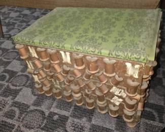 Vintage wooden thread spool footstool or sewing box seat in a folk art or tramp art style