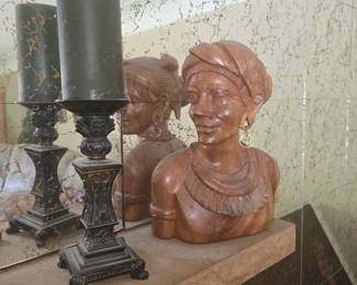 hardwood bust of a woman from the Igorot people of the Cordillera region in the Philippines, typically dating from the mid-20th century.
