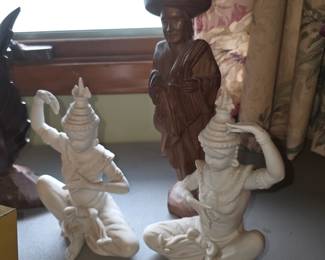 vintage white porcelain Thai (Siamese) temple dancer figurines (often styled in a blanc de chine or glazed porcelain finish, commonly produced mid-century by makers like UC&GC in Korea or manufacturers in Japan