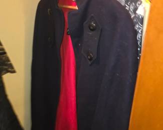 World War II-era nurse's wool cape (or cloak) in navy blue with a bright red flannel or satin lining