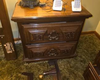 vintage, ornate two-drawer wooden nightstand or end table, commonly associated with Spanish Mediterranean, Mediterranean Revival, or rustic vintage furniture styles from makers like Link-Taylor (such as the Majorca collection) or American of Martinsville