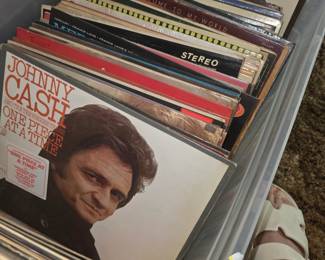 the vintage vinyl LP "One Piece at a Time" by Johnny Cash and the Tennessee Three, released in 1976 on Columbia Records.