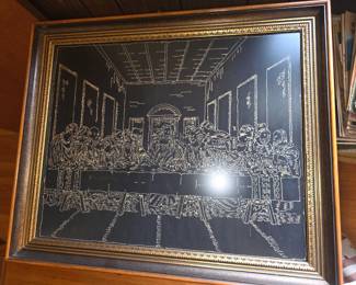 gold-lined black scratchboard or foil-etching art piece depicting The Last Supper after Leonardo da Vinci, featuring Jesus and his apostles seated at a long table