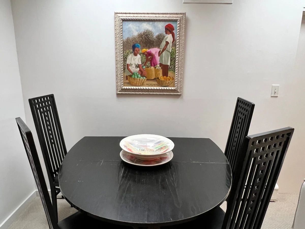 Ebonized ash folding oval dining table with five high-back chairs, in the Charles Rennie Mackintosh Model 322/DS1 design; maker not yet verified. Bowl not included. Haitian Artwork sold seperately.