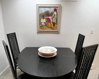 Ebonized ash folding oval dining table with five high-back chairs, in the Charles Rennie Mackintosh Model 322/DS1 design; maker not yet verified. Bowl not included. Haitian Artwork sold seperately.