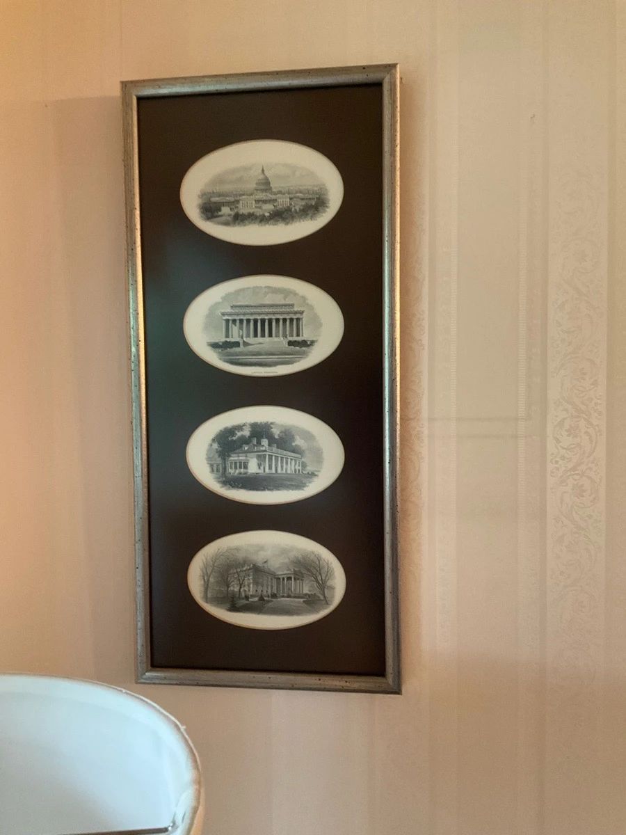 Framed Historical Oval Prints Set — Tall framed grouping of four oval black-and-white historical architectural prints in a silver-gilt frame with dark mat. Each oval depicts a different classical building or estate; overall piece has a narrow rectangular profile suited for hallways or entry walls. Measures approximately 36 inches tall by 12 inches wide and about 1 inch deep, making it lightweight and easy to hang. Frame and prints are in good condition with minor surface wear to the frame and no visible tears or mat stains.