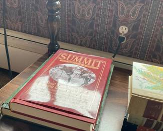 SUMMIT 25th Anniversary Edition — SUMMIT 25th Anniversary Edition is a hardcover history titled SUMMIT with a red dust jacket; the cover reads "25th Anniversary Edition" and appears to be a regional gold-rush/history volume. The book shows shelf wear to the jacket edges and a small crease at the lower front corner but the binding and pages appear intact from shown images. A solid reference or coffee-table book in collectible condition for regional history collectors or local libraries. Measures approximately 11.5 x 9 x 1.5 inches.