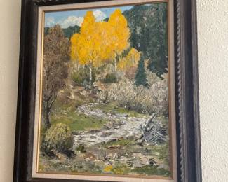 Framed Autumn Landscape Oil Painting — Oil-on-board landscape depicting a small stream and bright yellow aspen or cottonwood trees set against darker evergreens, presented in a wide carved dark wood frame with linen liner and gilt slip. The brushwork is impasto and impressionistic; lower right shows a small signature that appears to read "Harlan" or similar but is not fully legible in photos. Frame shows light wear at corners and surface scuffs; painting surface appears intact with normal age-related craquelure and varnish toning. Overall a decorative framed oil suitable for wall display; see dimensions for sizing.