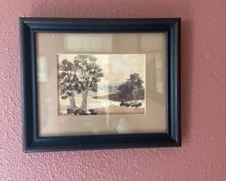 Framed Landscape Print Signed Robin — Small framed landscape print signed lower left "Robin" depicting trees and a river in muted earth tones. Housed in a black wood frame with double mat (beige outer, thin cream inner) behind glass; frame shows light scuffs and the mat has slight toning. Unframed image area is small—suits a hallway or study—piece appears decorative rather than original oil or canvas. Measurements below are approximate from photos.