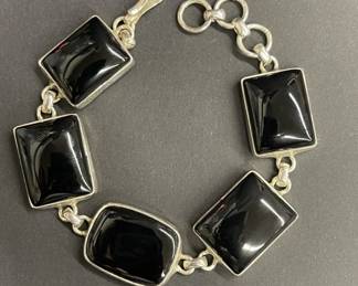 Lot 460h  Vintage sterling silver and black onyx link