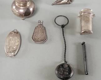 090  Lot 267  Sterling silver salt shaker, brooch, key ring,