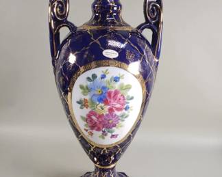 Lot 196  Blue floral porcelain urn by Baum Bros