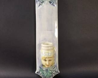 Lot 389  Art nouveau ceramic wall pocket depicting a