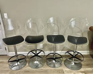025  Lot 389h  4 Lucite  chrome barstools with black cushions