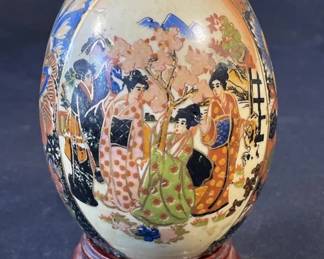 Lot 340h  Large handpainted ceramic egg with stand
