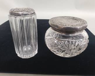 Lot 521  Two sterling silver lidded cut crystal jars