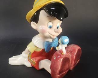 Lot 322  Disney ceramics and blanket, Pinocchio music box